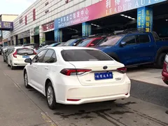 2022 Toyota Corolla 1.8L Hybrid E-CVT, белый — фото 4