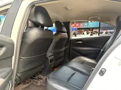 2022 Toyota Corolla 1.8L Hybrid E-CVT, белый — фото 7
