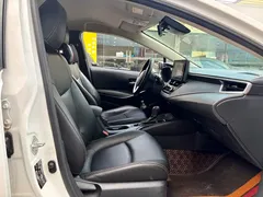 2022 Toyota Corolla 1.8L Hybrid E-CVT, белый — фото 8