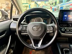 2022 Toyota Corolla 1.8L Hybrid E-CVT, белый — фото 12