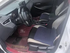 2021 Toyota Corolla Hybrid 1.8L E-CVT Elite, белый — фото 9