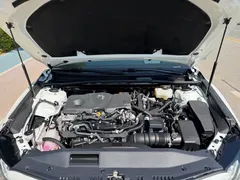 2023 Toyota Camry Hybrid 2.5HS Fashion, белый — фото 9