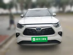2022 Toyota Highlander Hybrid 2.5L 4WD Premium 7-seat, белый — фото 2