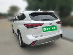 2022 Toyota Highlander Hybrid 2.5L 4WD Premium 7-seat, белый — фото 4
