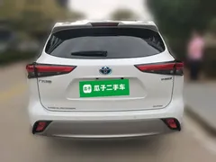 2022 Toyota Highlander Hybrid 2.5L 4WD Premium 7-seat, белый — фото 5