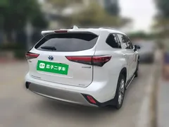2022 Toyota Highlander Hybrid 2.5L 4WD Premium 7-seat, белый — фото 6