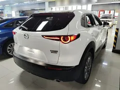 2020 Mazda CX-30 2.0L AT, белый — фото 7