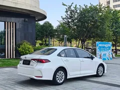 2021 Toyota Corolla 1.2T S-CVT Pioneer, белый — фото 9
