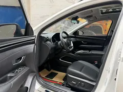 2023 Hyundai Tucson L 1.5T AT 2WD DLX Luxury, белый — фото 7