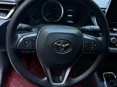2023 Toyota Corolla 1.2T Elite, белый — фото 5