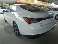 2021 Hyundai Elantra 1.5L CVT LUX Premium, белый — фото 5
