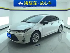 2021 Toyota Corolla Hybrid 1.8L E-CVT Elite, белый — фото 1