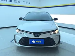 2021 Toyota Corolla Hybrid 1.8L E-CVT Elite, белый — фото 2
