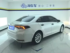 2021 Toyota Corolla Hybrid 1.8L E-CVT Elite, белый — фото 3