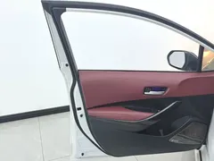 2021 Toyota Corolla Hybrid 1.8L E-CVT Elite, белый — фото 7