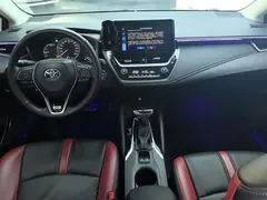 2021 Toyota Corolla Hybrid 1.8L E-CVT Elite, белый — фото 12