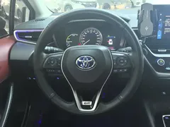 2021 Toyota Corolla Hybrid 1.8L E-CVT Elite, белый — фото 15