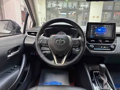 2021 Toyota Corolla 1.2T S-CVT Elite Plus, белый — фото 16