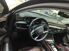 2023 Audi A8L 50 TFSI quattro Premium, чёрный — фото 3