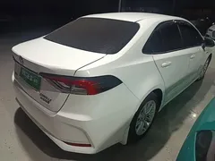 2023 Toyota Corolla 1.8L Hybrid Elite, белый — фото 7