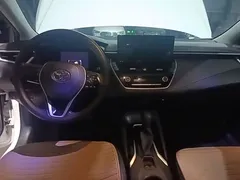 2023 Toyota Corolla 1.8L Hybrid Elite, белый — фото 11