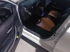 2023 Toyota Corolla 1.8L Hybrid Elite, белый — фото 18