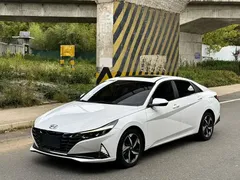 2021 Hyundai Elantra 1.5L CVT LUX Premium, белый — фото 1