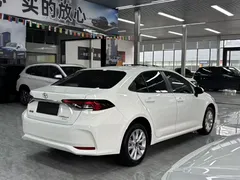 2023 Toyota Corolla 1.2T Elite, белый — фото 10