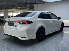 2021 Toyota Corolla TNGA 1.5L CVT GR Sport, белый — фото 4