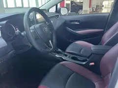 2021 Toyota Corolla TNGA 1.5L CVT GR Sport, белый — фото 7