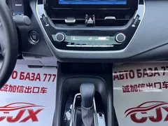2023 Toyota Corolla 1.2T Elite, белый — фото 11