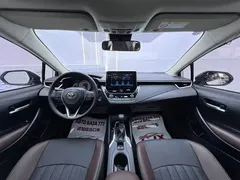 2023 Toyota Corolla 1.2T Elite, белый — фото 13
