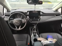2022 Toyota Corolla 1.8L Hybrid E-CVT, белый — фото 10