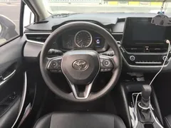2022 Toyota Corolla 1.8L Hybrid E-CVT, белый — фото 11