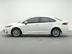 2021 Toyota Corolla 1.2T S-CVT Luxury, белый — фото 2