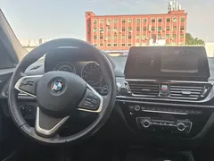 2021 BMW 1 Series 120i M Sport, белый — фото 13