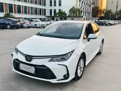 2021 Toyota Corolla 1.2T S-CVT Elite Plus, белый — фото 1