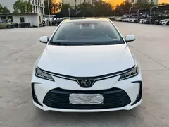 2021 Toyota Corolla 1.2T S-CVT Elite Plus, белый — фото 2