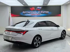2022 Hyundai Elantra 1.5L CVT LUX Premium, белый — фото 4