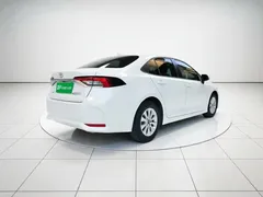 2021 Toyota Corolla TNGA 1.5L CVT Elite, белый — фото 4