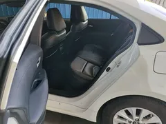 2021 Toyota Corolla TNGA 1.5L CVT Elite, белый — фото 13