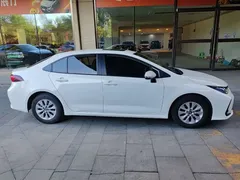 2021 Toyota Corolla TNGA 1.5L CVT Elite, белый — фото 26