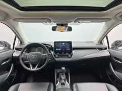 2021 Toyota Corolla 1.2T S-CVT Elite, белый — фото 23