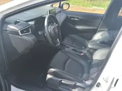 2019 Toyota Corolla 1.2T S-CVT GL-i Elite, белый — фото 11