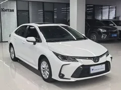 2021 Toyota Corolla 1.2T S-CVT Elite Plus, белый — фото 2