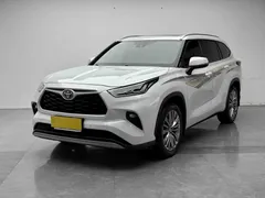 2022 Toyota Highlander Hybrid 2.5L 4WD Premium 7-seat, белый — фото 1