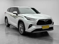 2022 Toyota Highlander Hybrid 2.5L 4WD Premium 7-seat, белый — фото 3