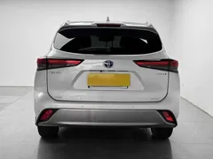 2022 Toyota Highlander Hybrid 2.5L 4WD Premium 7-seat, белый — фото 4