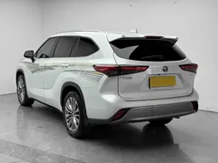 2022 Toyota Highlander Hybrid 2.5L 4WD Premium 7-seat, белый — фото 5