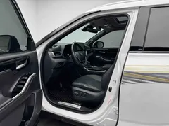 2022 Toyota Highlander Hybrid 2.5L 4WD Premium 7-seat, белый — фото 6